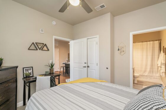 Furnished bedroom with private bathroom