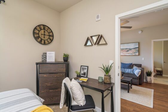 Furnished bedroom with desk