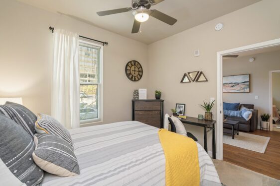 Furnished bedroom with large window