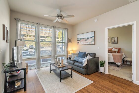 Furnished living space with large windows